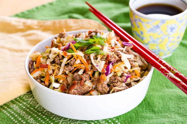 egg roll in a bowl with chopstick