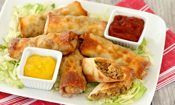 air fried egg rolls with greens and sauces