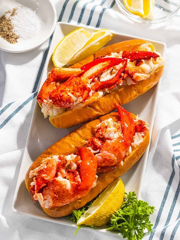 well served lobster roll with lime and salt